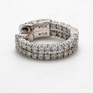 0.5' Inside out hoop earrings with prong set (34) round diamonds & with special spring lock.  D0.85ct.t.w.