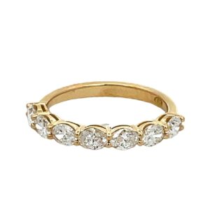 7-stone band east west style in 18K YG with prong set oval diamonds.  D0.96ct.t.w.  Size 5.75