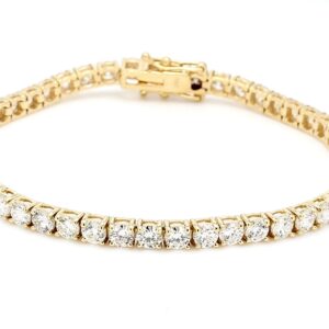7' Tennis bracelet in yellow gold with 4-prong set (48) round diamonds.  D8.00ct.t.w.