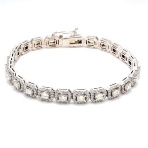 7' Halo tennis bracelet with prong set rounds and emerald cut diamonds.  D7.10ct.t.w.