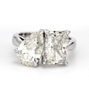 2-stone ring with claw prong set pear shape and radiant cut diamonds.  D5.08ct.t.w.